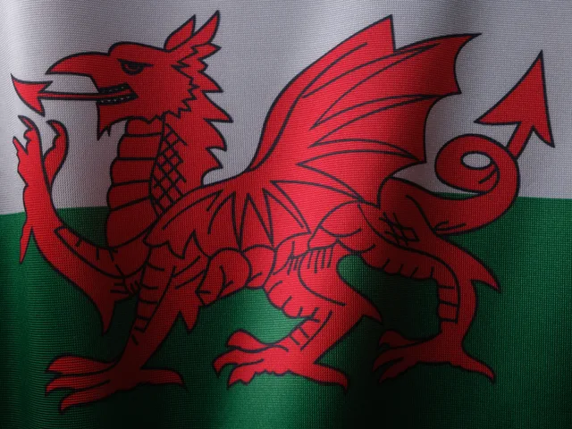 Detailed close-up of the Welsh flag featuring the iconic red dragon symbol. Wales and Scotland programmatic targeting for language and culture